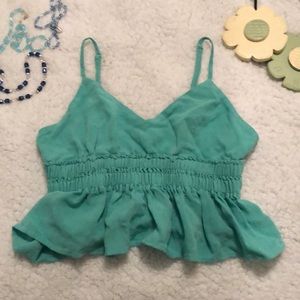 Green/teal crop top